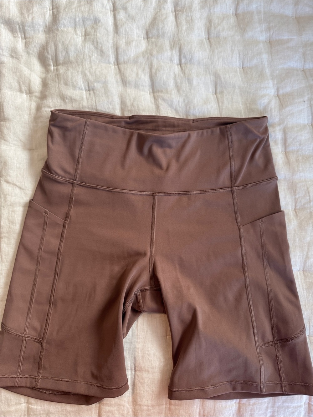 Athleta Women’s Ultimate Stash 7” Short Bike Shorts in Mauve